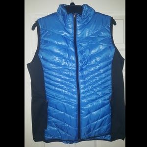Xersion puffer vest in black and blue